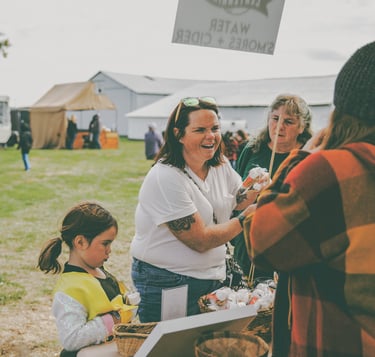 group of women enjoying a fall harvest festival