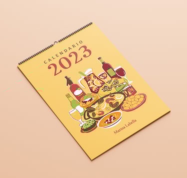 a 2023 calendar cover with food plates of Spanish gastronomy