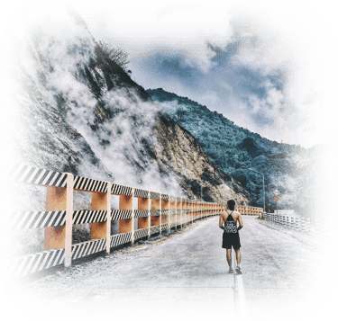 a person walking down a road with a backpack