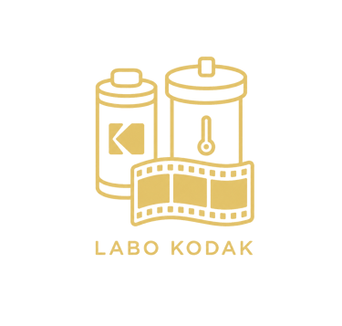 Gold Labo Kodak logo featuring 35mm film rolls and developing tanks on a black background.