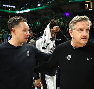 Mitch Johnson and Chris Finch, head coaches of the Spurs and Timberwolves, during game 6 (May 15, 2026)