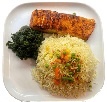 Somali fish dish with rice and vegetables at Paradise Kentish Town London