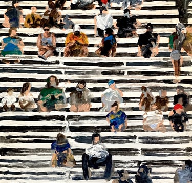a group of people sitting on a large set of stairs in the stadium