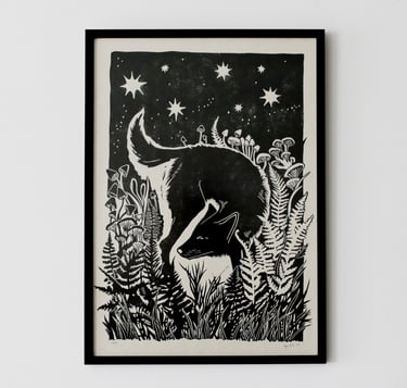 a black and white drawing of a cat in a field