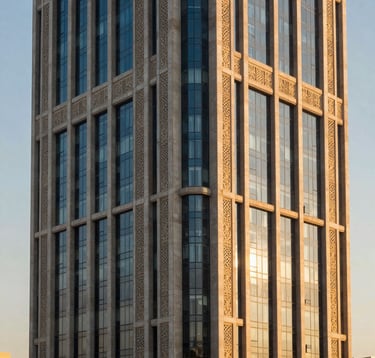 Architectural detail of a contemporary financial building in North Africa, combining traditional motifs with modern glass and steel design. The lighting is golden hour, reflecting a warm, ambitious sunset. High contrast, professional architectural photography.