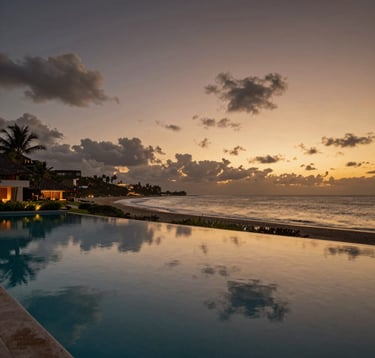 A serene photograph of an infinity pool at a luxury boutique hotel in Puerto Escondido, overlooking the beach at dusk. The water is still, reflecting the deep bronze and gold of the sky. Elegant and secure vibe, Latin American / Mexican landscape.