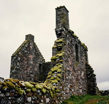 A cinematic shot of an ancient Northern European / Scottish stone castle ruin against a moody soft off-white sky. Muted sage green moss clings to the dark stones, creating a romantic, historic atmosphere.