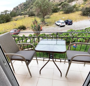 a table with chairs and a table with a glass top