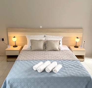 a bed with towels and towels on it