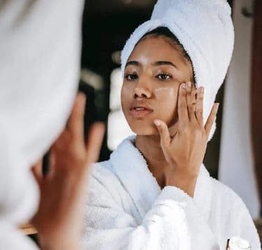 put cream on face after shower see the face in mirror