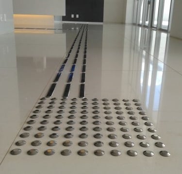 Elemento tátil inox