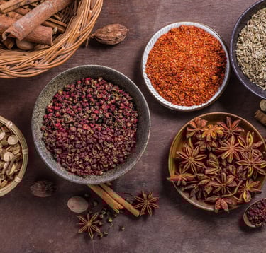 a variety of spices and spices in bowls
