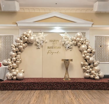 Elegant neutral themed balloon garland with gold and beige