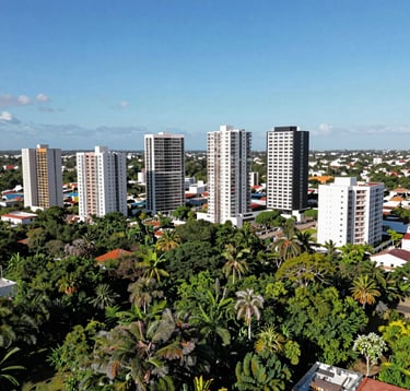 A cinematic drone shot of the Temozón Norte area in Mérida, showing rapid modern development mixed with vibrant Yucatán jungle. Bright sunny day, clear blue sky, emphasizing growth and location.