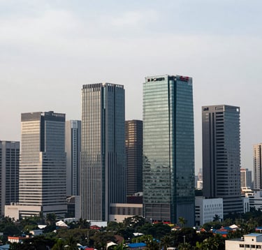 A wide-angle professional photograph of the modern Chennai skyline near Porur, featuring sleek commercial buildings with glass facades reflecting a soft white sky. The image should convey progress and infrastructure development.