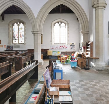 Building Blocks toddler group at All Saints Church Great Chesterford with toy areas set up inside the church.