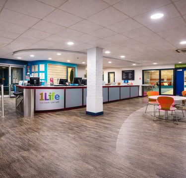 Reception and cafe seating area inside Lord Butler Leisure Centre in Saffron Walden