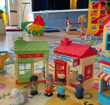 Role play toys and play mats inside Newport Playgroup at Newport Village Hall near Saffron Walden baby and toddler group