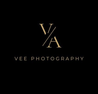 Elegant gold Vee Photography logo with a VA monogram on a black background for professional photography services.