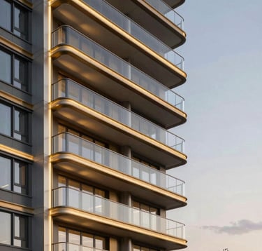 Modern luxury apartment building exterior at twilight. The architecture features clean lines, glass balconies, and warm brushed gold lighting accents. The sky is a soft dusk color, emphasizing the premium and calm mood.