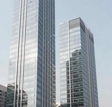 A minimalist architectural shot of a modern glass skyscraper in an Indian business district. The image emphasizes high-end design, secure structures, and a crisp white aesthetic.
