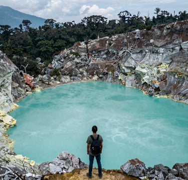 A breathtaking landscape photo of the Kawah Putih volcanic crater near Bandung. The turquoise water contrasts with the white acidic soil and dark forest green trees on the crater rim. The atmosphere is mystical and cool, featuring a Southeast Asian / Indonesian traveler looking at the view.