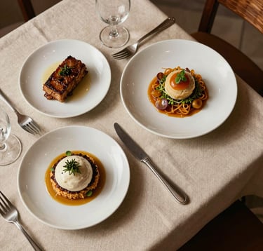 A top-down photograph of a gourmet, artisanal meal at a Scandinavian-style restaurant in the Middle Eastern / Gulf region, featuring neutral beige linens, dark brown wooden accents, and soft, natural morning light.