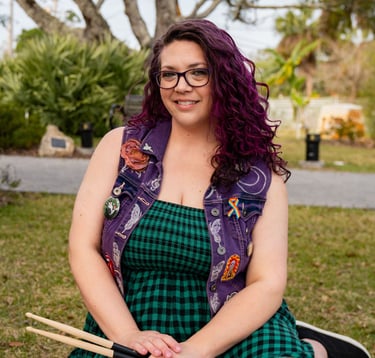 Self portrait, purple hair, smiling, green dress, purple vest
