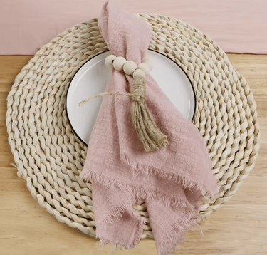 Serviette rose pâle