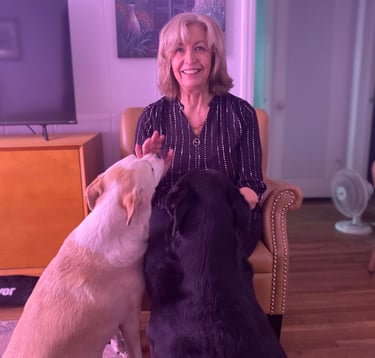 womanwithtwodogsoneblackonewhite