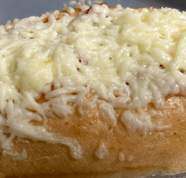 Turkey meatball sub hoggie with melted cheese on top