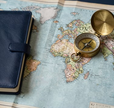 A top-down aesthetic flatlay of a vintage map, a leather journal, and an old brass compass. The lighting is soft and professional, using deep navy tones (#1C2C39) to suggest reliability, wisdom, and thoughtful planning.