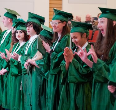 Excel Center Graduation, Graduates in caps and gowns