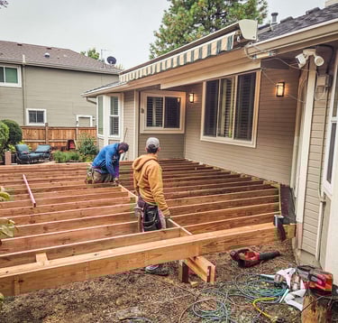 Custom deck framing project behind a home in Lakewood CO
