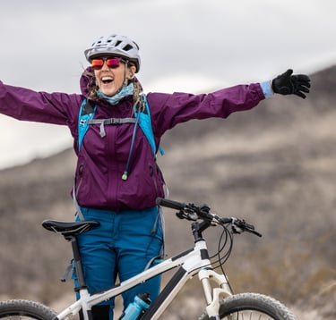 Woman mountain biking in Colorado
