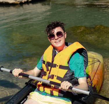 Person kayaking with UV protection