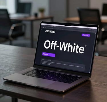 An ultra-slim, dark aluminum laptop open in a dimly lit, high-end North American office, the screen showing a sleek, fast-loading digital interface with Off-White typography and Macroon Purple accents.