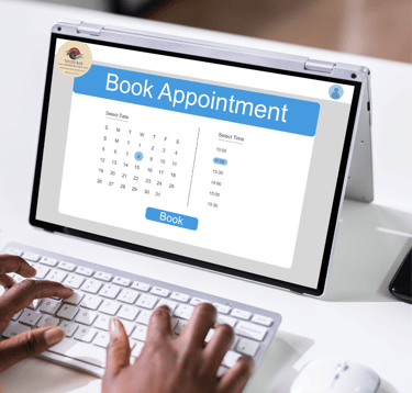 Laptop screen displaying a 'Book Appointment' interface for scheduling business consultations.