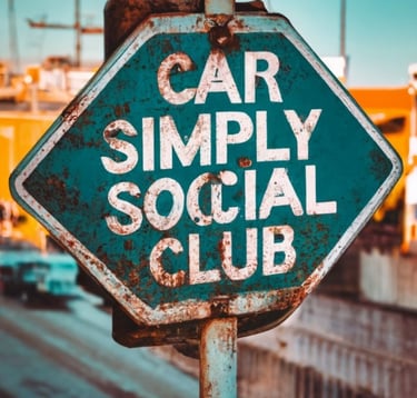 a sign that says car simply social club
