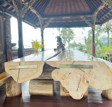 Outdoor Joglo living space built with antique teak wood offering natural ventilation and elegant tropical ambiance