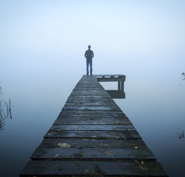Man in contemplation, representing men’s mental health.