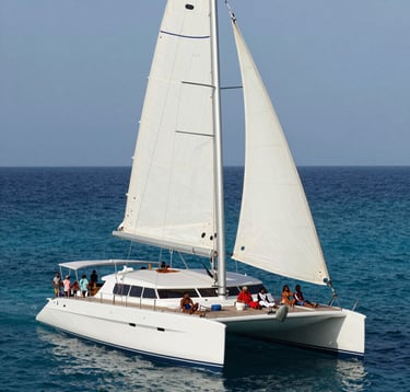 A luxury catamaran sailing on the turquoise waters of the Andaman Islands. South Asian / Indian passengers are relaxing on the deck under a white canopy. The scene is bright and airy, with colors of Steel Blue water and Off-White sails, conveying a sense of high-quality travel and comfort.