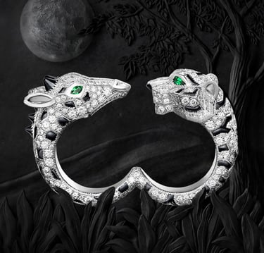 Cartier diamond panther bracelet with emerald eyes.