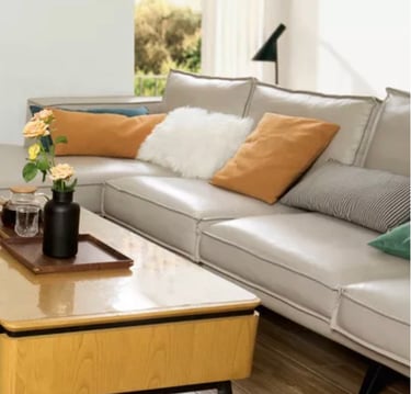 a living room with a couch and a coffee table