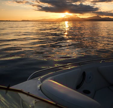 Sunset view from a boat in Alcudia Port during a Private Tour