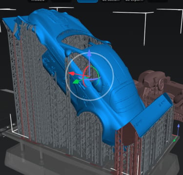 A 3D model of a car body with support structures being prepared in SLA 3D printing software.
