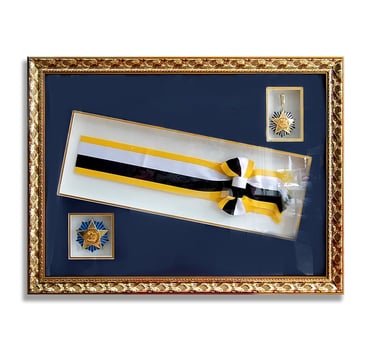The perfect shadow box frame showcasing medals and a ribbon.