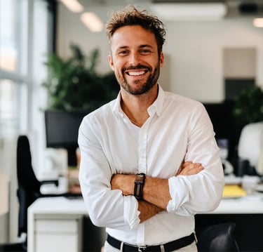 a man with a beard and a white shirt