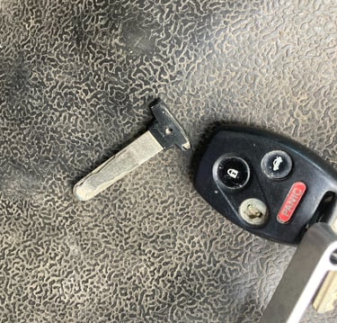 Broken Honda key replacement Philadelphia – mobile locksmith cutting new Honda key