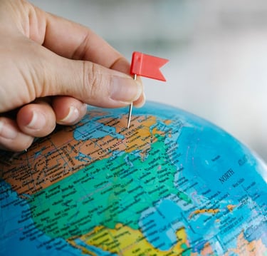 a person's hand holding a pin pinpoint pin pinpoint pinpoint pin